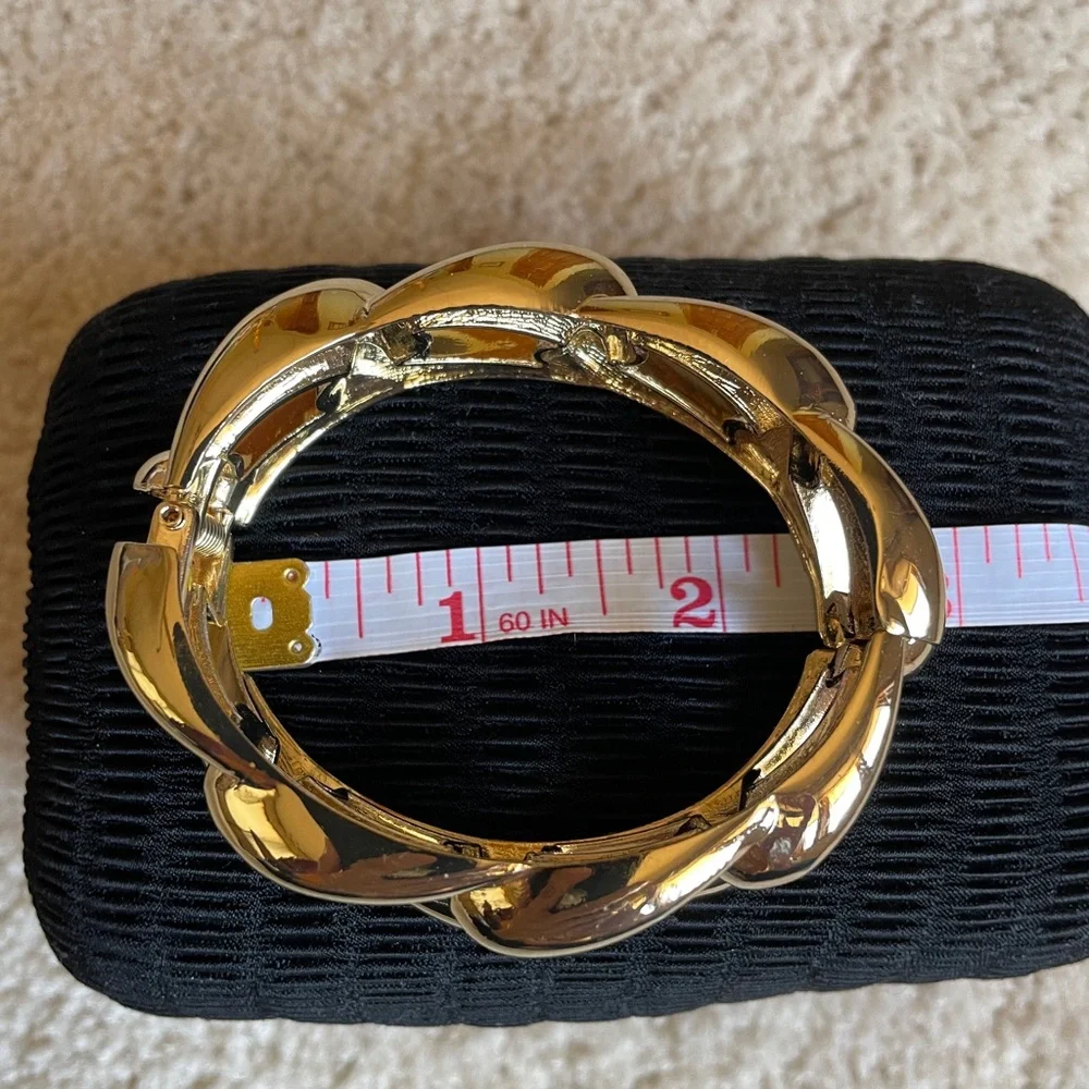 EUC Women’s Gold-tone Chunky braided cuff bracelet.